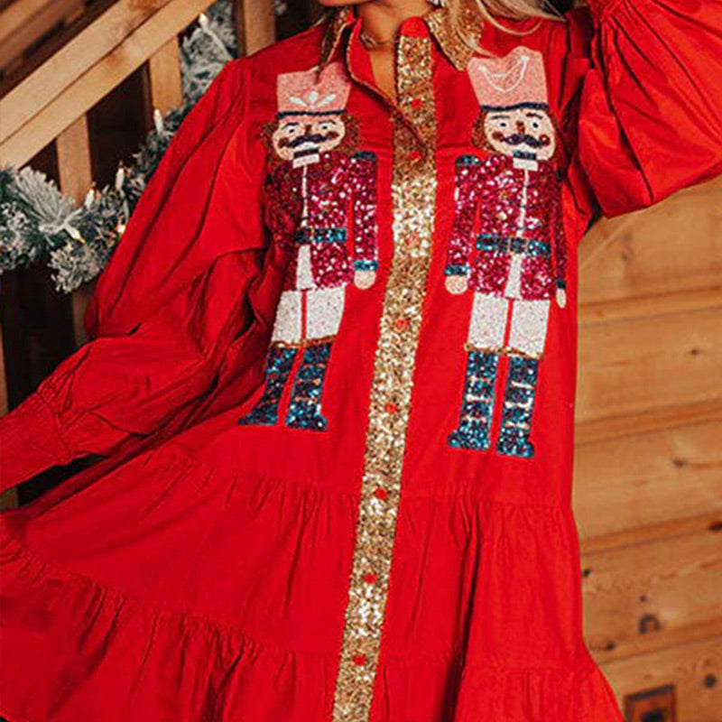 Langärmeliges Minikleid mit Nussknacker-Pailletten und Knopfleiste