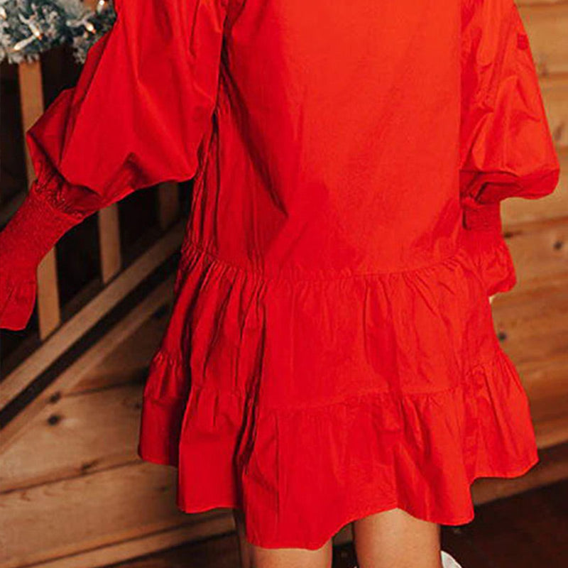 Langärmeliges Minikleid mit Nussknacker-Pailletten und Knopfleiste