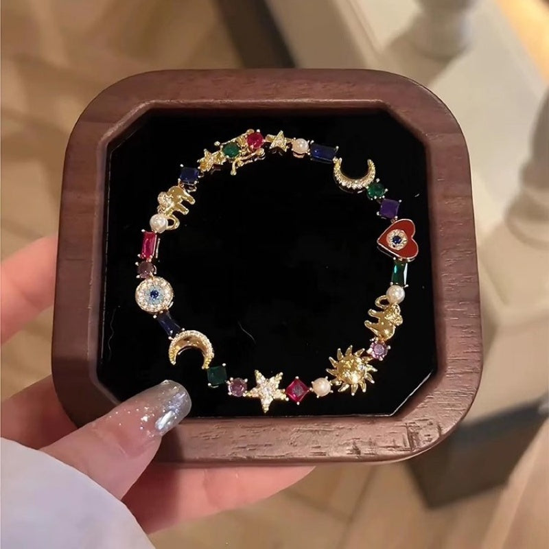 💫 LIMITED-TIME 50% RABATT! ✨ Himmelscharme-Armband – Sonne, Mond, Sterne, Kristalle, Goldton 🪐